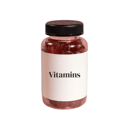 Pink bottle filled with red gummy vitamins, white label with black text, and black cap.