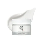Beauty of Joseon Dynasty Cream frosted jar on a white cream backdrop.