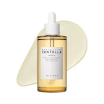 SKIN1004 Madagascar Centella Ampoule dropper bottle over a liquid swatch.