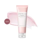 SKIN1004 Centella Poremizing Deep Cleansing Foam 125ml tube over a light pink cream swatch.