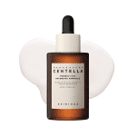 SKIN1004 Madagascar Centella Probio-Cica Intensive Ampoule bottle over a milky liquid swatch.