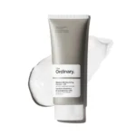 The Ordinary Natural Moisturizing Factors + HA matte grey squeeze tube.