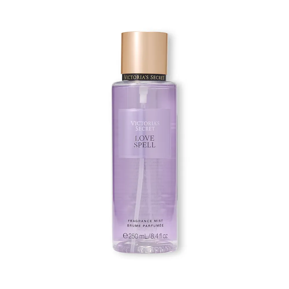 Victoria's Secret Love Spell Fragrance Mist purple spray bottle with gold cap.