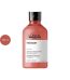 L'Oréal Professionnel Serie Expert Inforcer Shampoo 300ml pink coral-bottle with black cap.