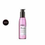 L’Oréal Liss Unlimited 125ml serum bottle with pink liquid and a black pump.