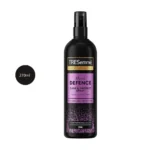 TRESemmé Care & Protect Heat Defence Spray 270ml black bottle with a red trigger spray nozzle.