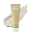 RETURNITY Yulmu Skinclean Mask beige squeeze tube on a textured clay mask smear background.