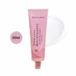 Mary & May Muguet & Lotus Hand Cream 50ml pink tube with cream smear and floral patterns.