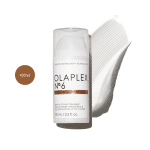 White cylindrical pump bottle with clear cap and a thick textured cream smear background.