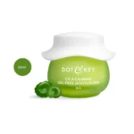 DOT & KEY CICA Calming Oil-Free Moisturizer 60ml green jar next to cica leaves.