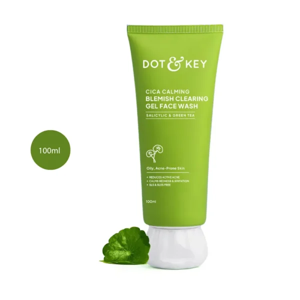 DOT & KEY Cica Calming Blemish Clearing Face Wash 100ml green tube next to a cica leaf.