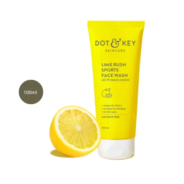 DOT & KEY Lime Rush Sports Face Wash 100ml yellow tube next to a lemon slice.