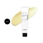 COSRX The Retinol 0.1 Cream 20ml white squeeze tube resting on a pale yellow cream swipe.
