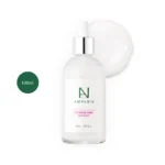 AMPLE:N Ceramide Shot Ampoule 100ml clear dropper bottle with a milky liquid splash.