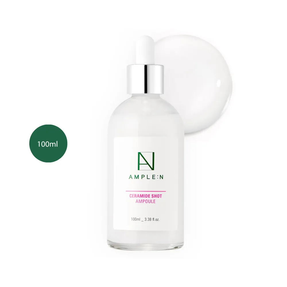 AMPLE:N Ceramide Shot Ampoule 100ml clear dropper bottle with a milky liquid splash.