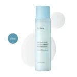 iUNIK Beta-Glucan Lacto Barrier Milk Essence 200ml light blue bottle with blue cap over white liquid splash.