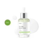iUNIK Tea Tree Relief Serum 50ml clear bottle with green liquid and dropper cap over liquid smear.