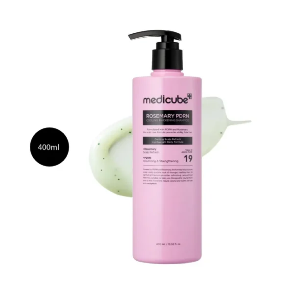medicube Rosemary PDRN Cooling Thickening Shampoo 400ml pink pump bottle over light green gel smear.